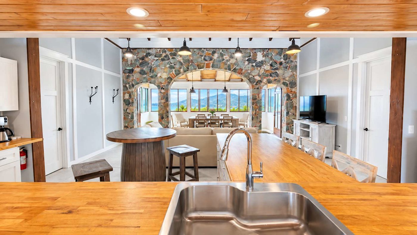 Spacious kitchen with stone arches
